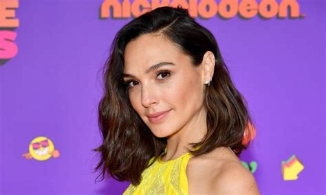 Gal Gadot turns heads with poolside bikini photos